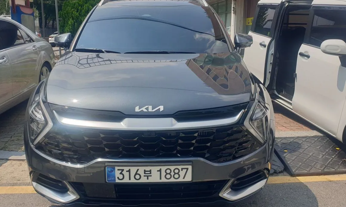 Kia Sportage — фото 1
