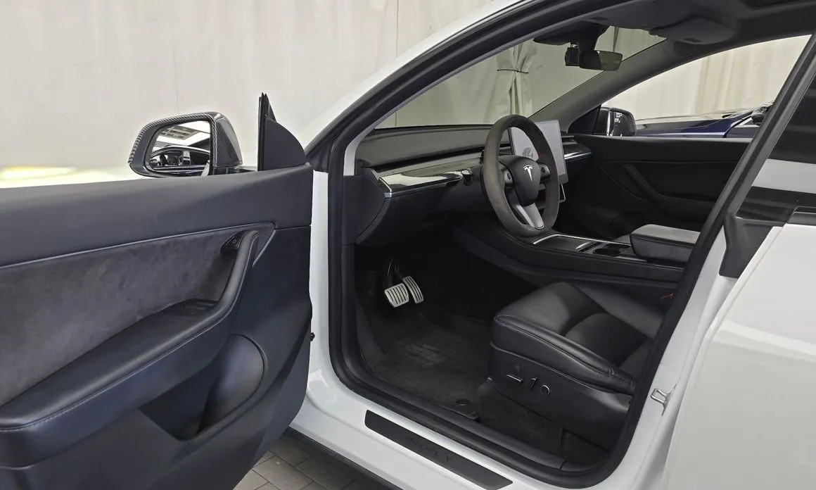 Tesla Model Y — фото 7