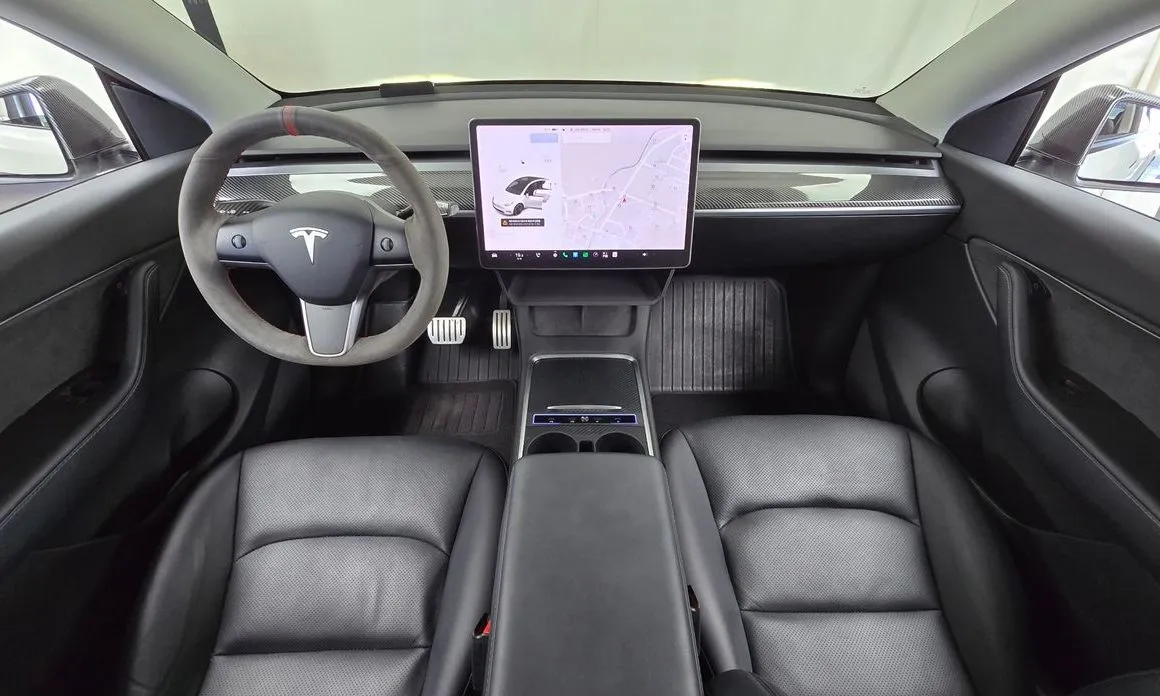 Tesla Model Y — фото 10