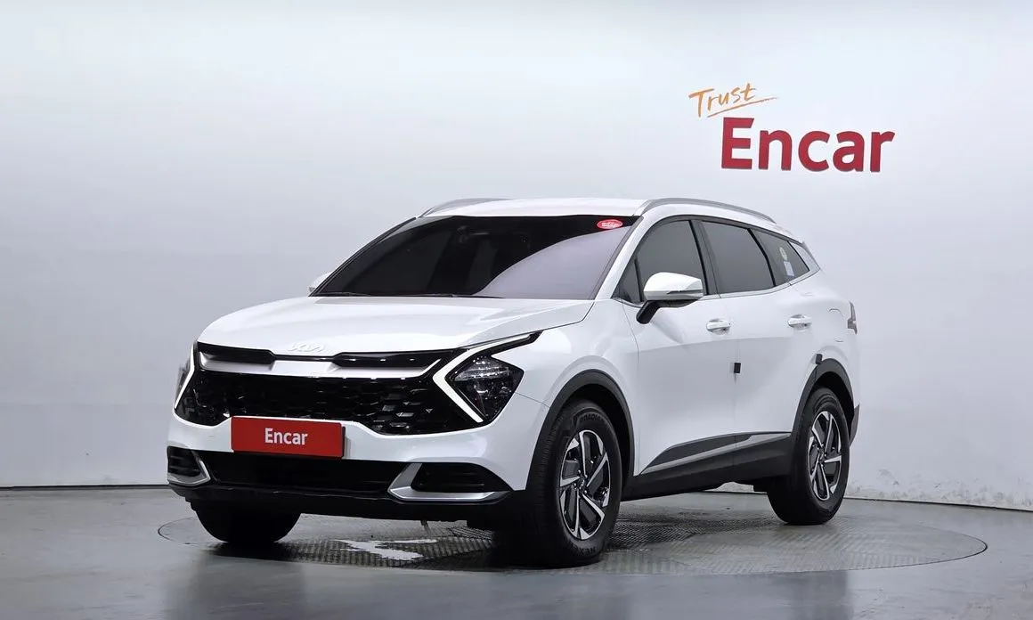Kia Sportage — фото 1