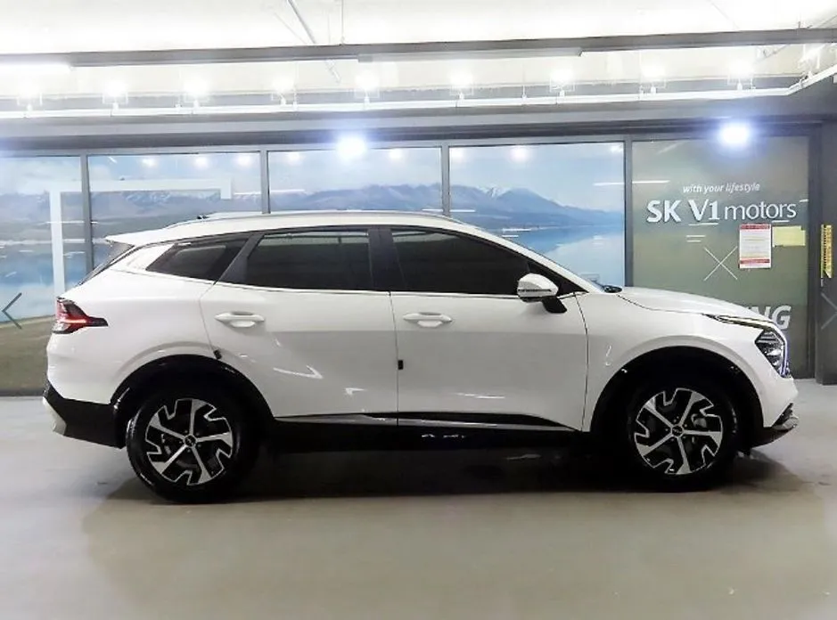 Kia Sportage — фото 5