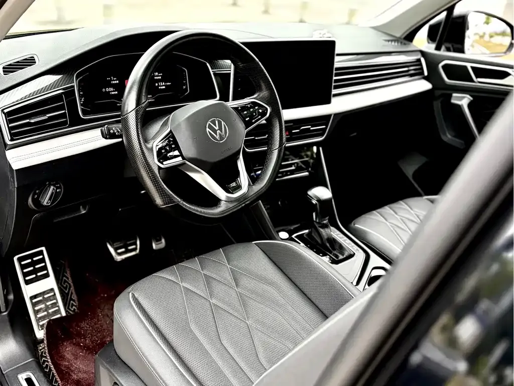 Volkswagen Tiguan L — фото 8