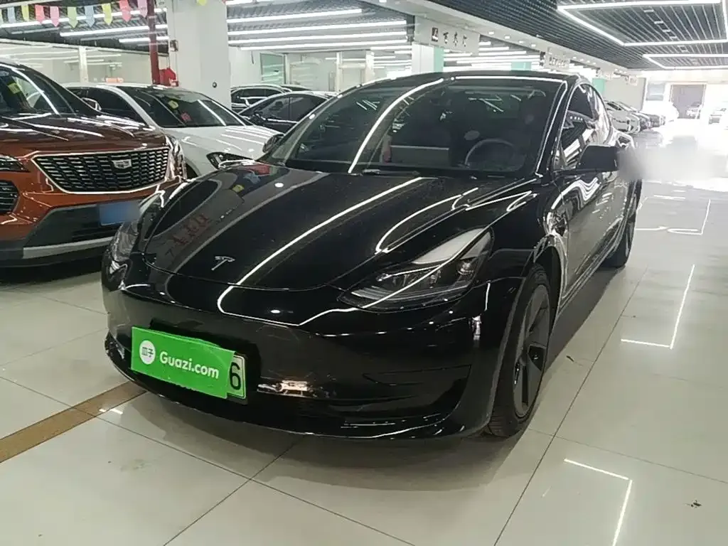 Tesla Model 3 — фото 5