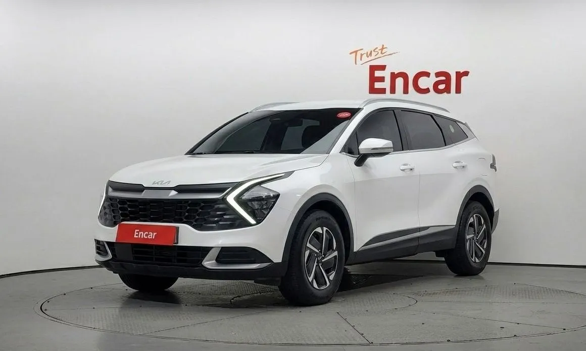 Kia Sportage — фото 1