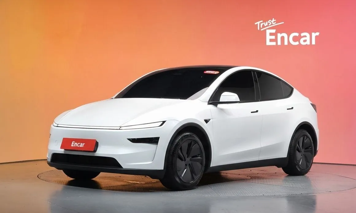 Tesla Model Y — фото 1