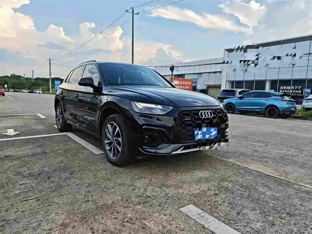 Audi Q5L — фото 5
