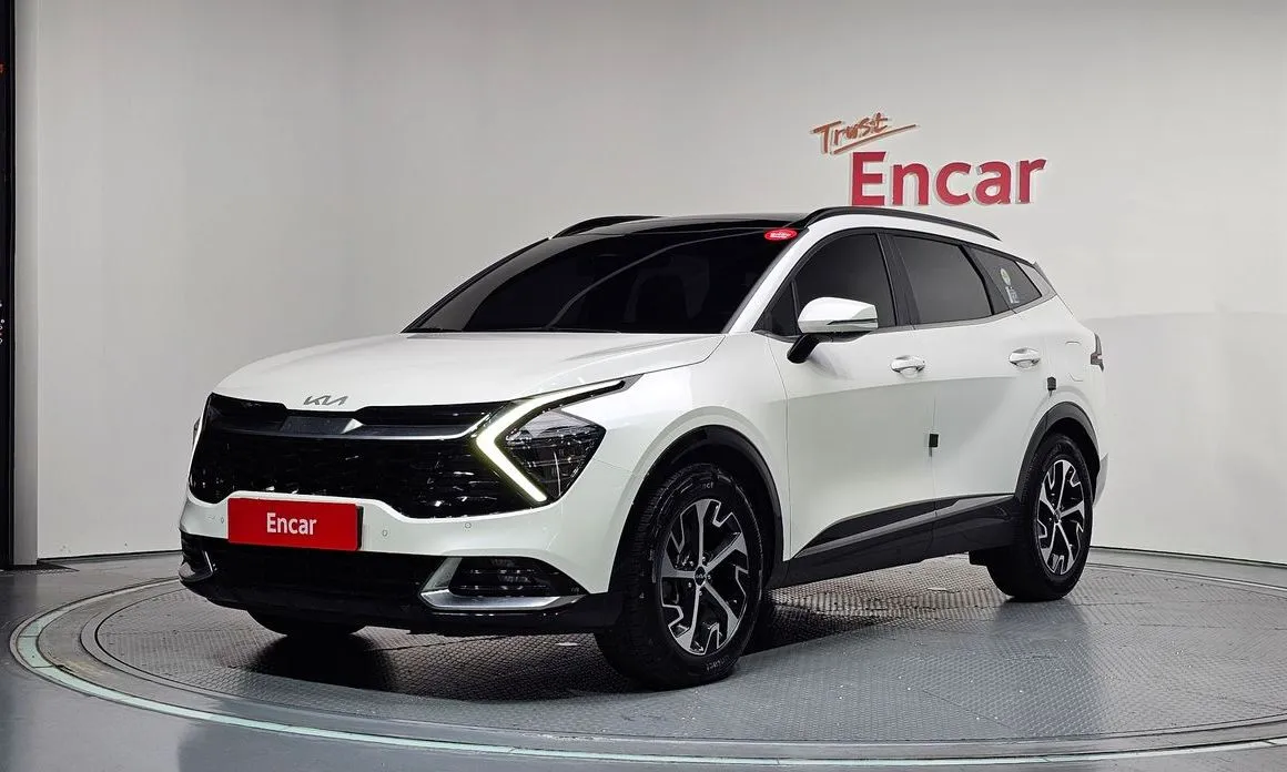 Kia Sportage — фото 1