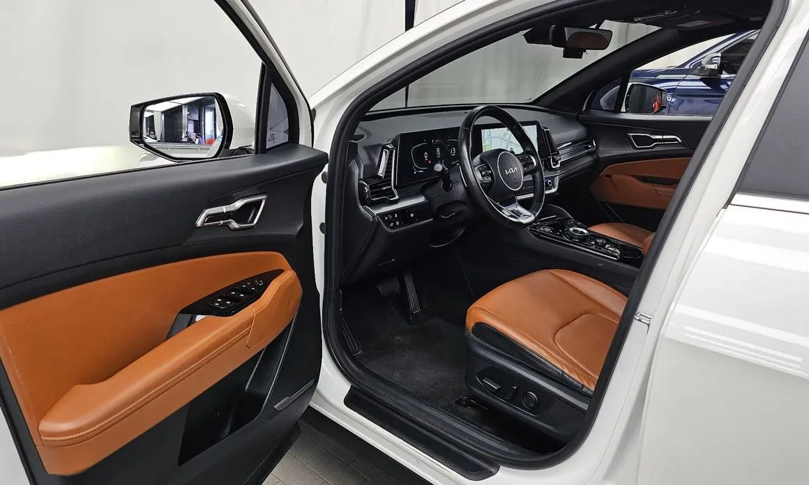 Kia Sportage — фото 7