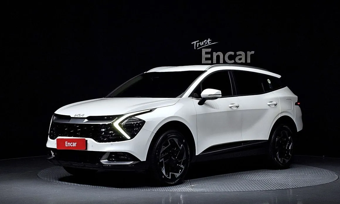 Kia Sportage — фото 1