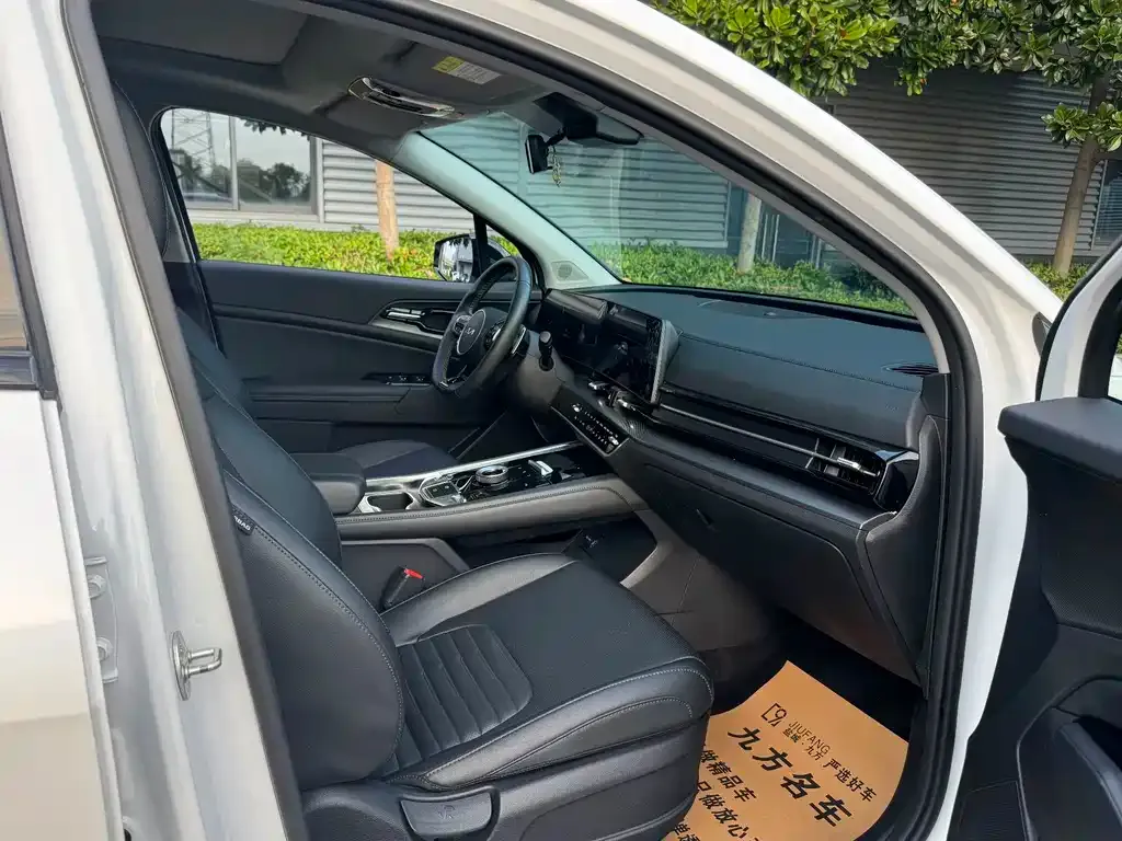 Kia Sportage — фото 7