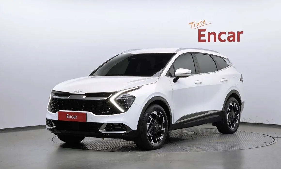 Kia Sportage — фото 1