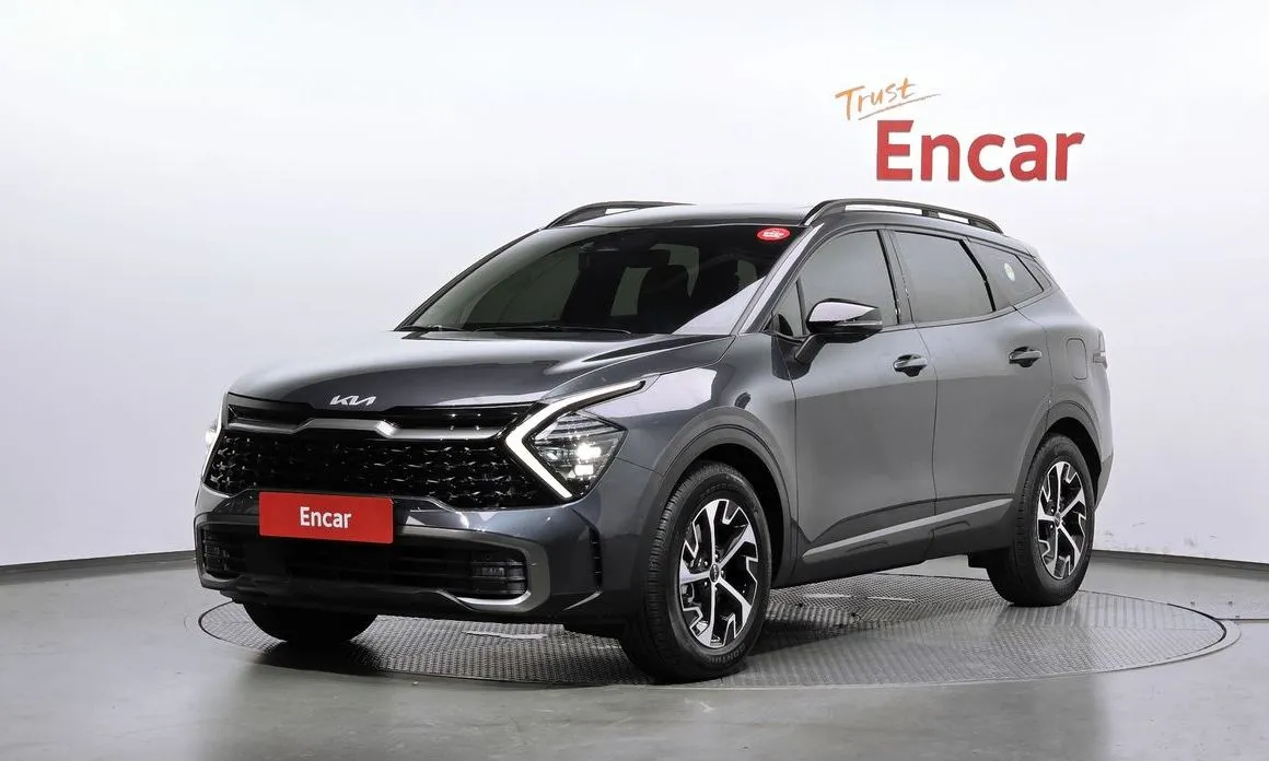 Kia Sportage — фото 1