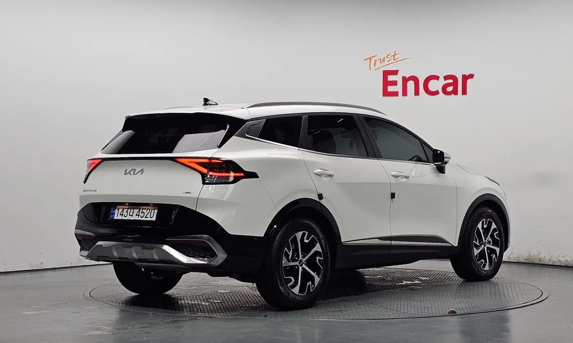 Kia Sportage — фото 7