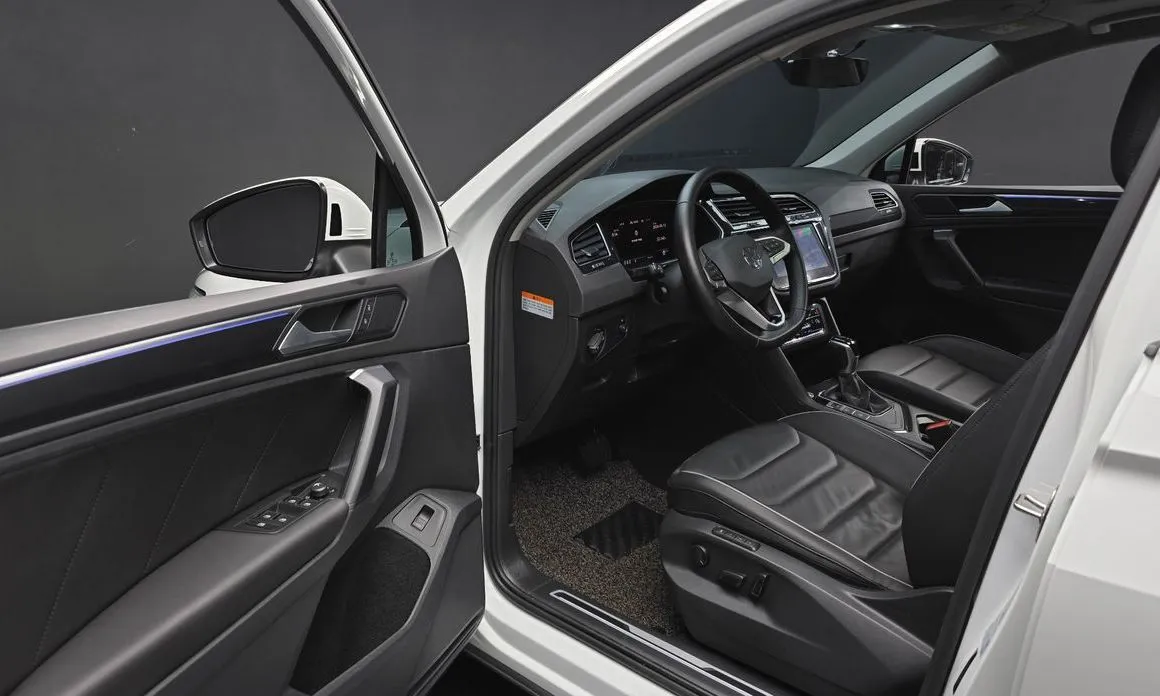 Volkswagen Tiguan — фото 7