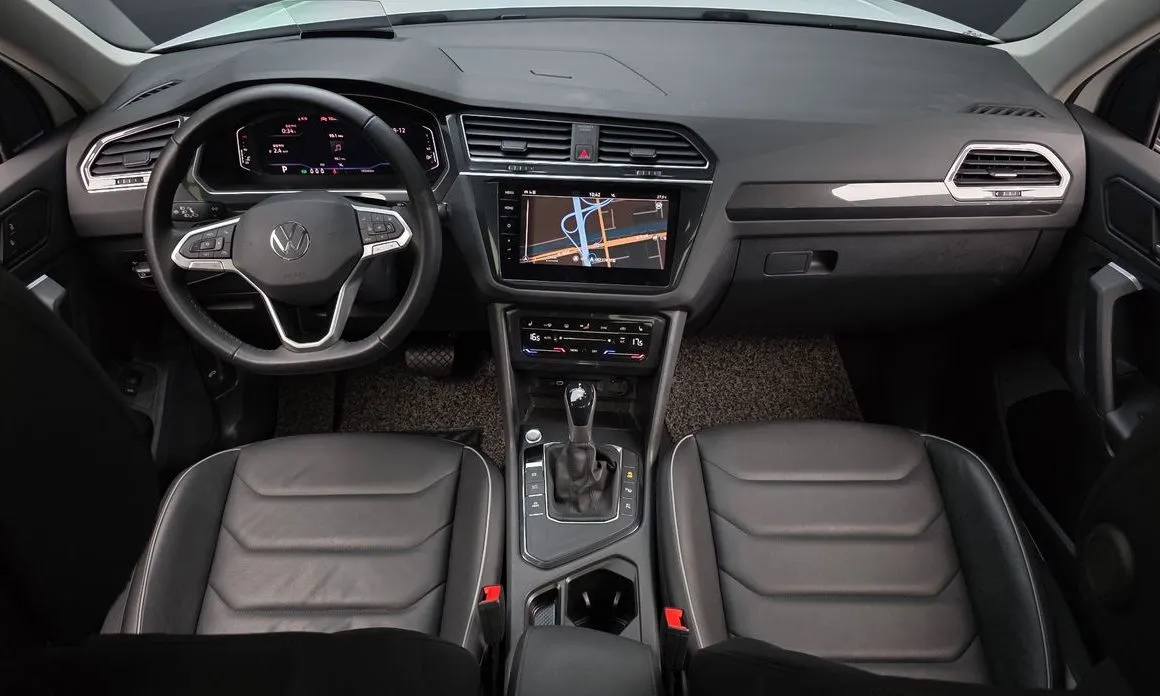 Volkswagen Tiguan — фото 8