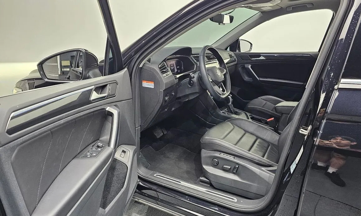Volkswagen Tiguan — фото 9