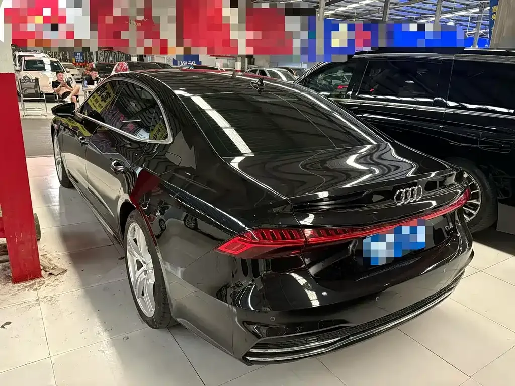 Audi A7L — фото 8