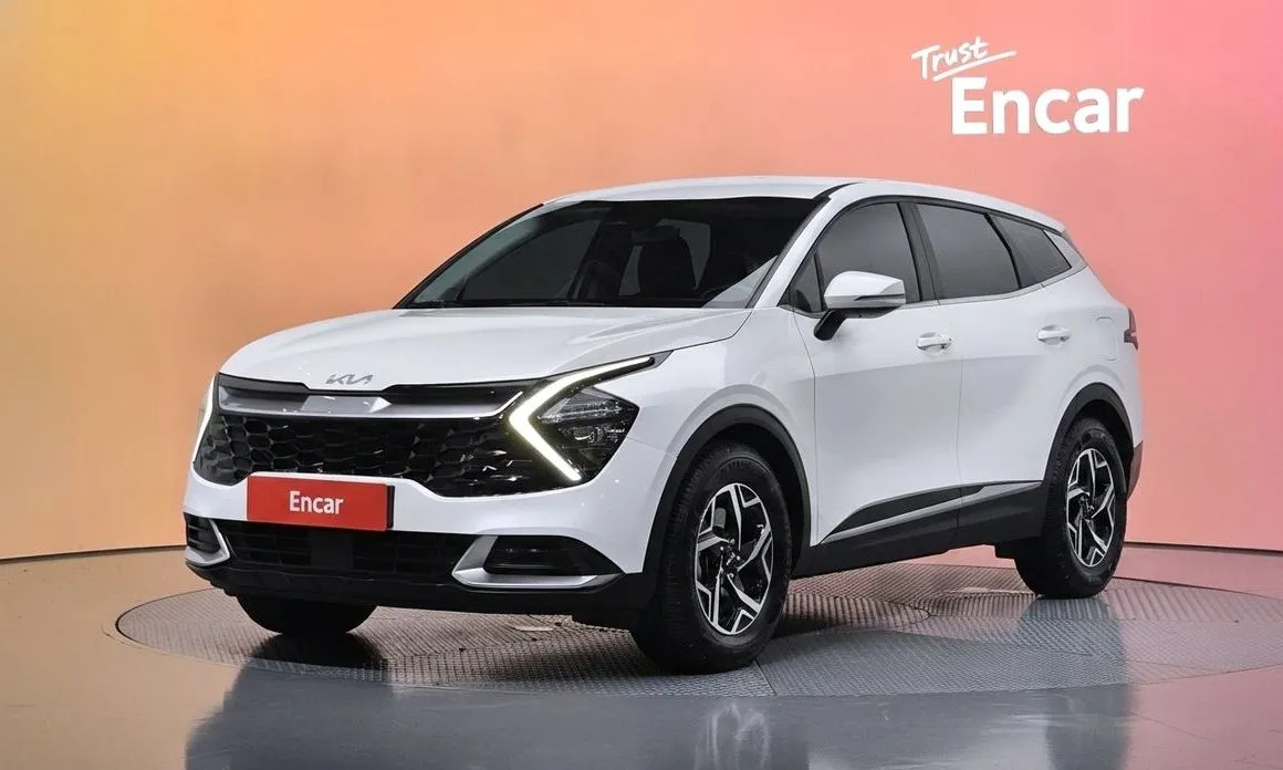 Kia Sportage — фото 1