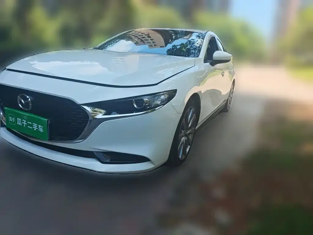 Mazda 3 Axela — фото 1