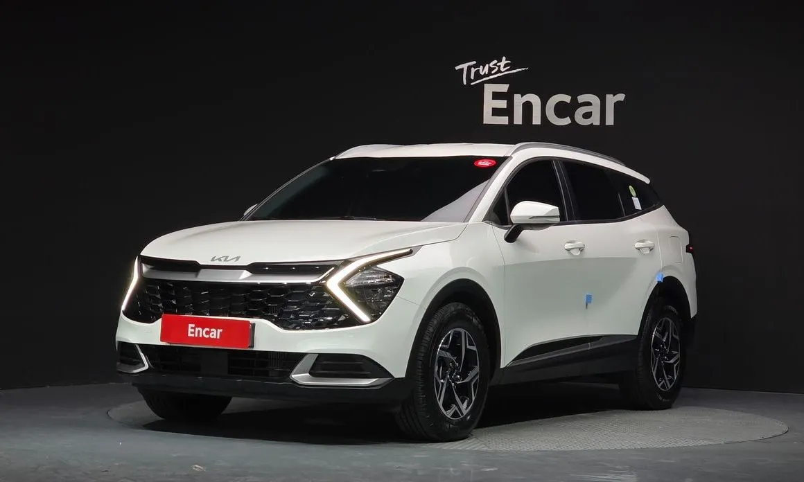 Kia Sportage — фото 1