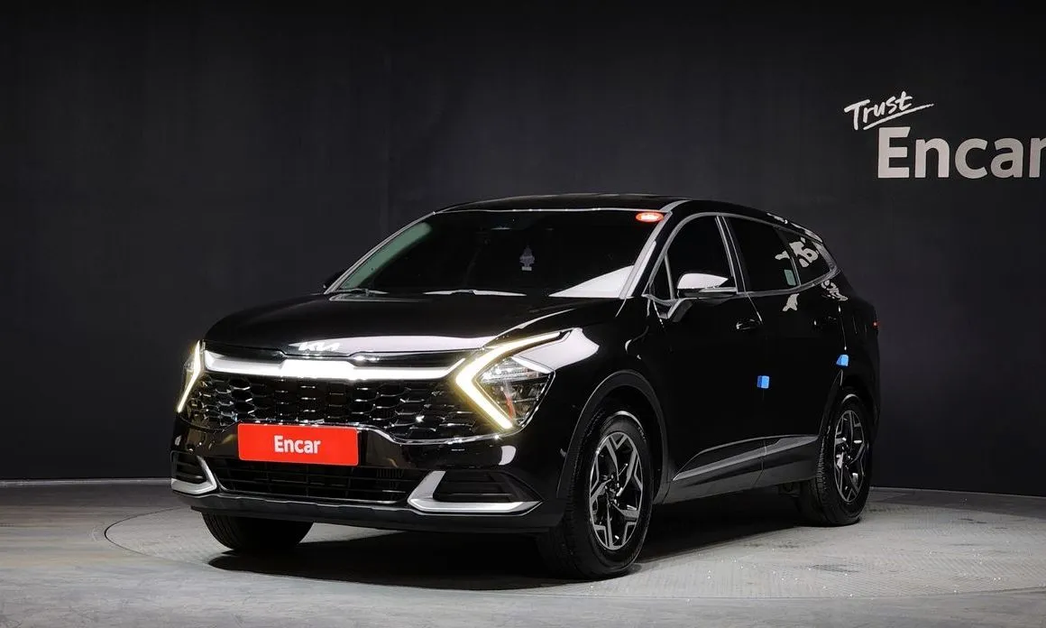Kia Sportage — фото 1