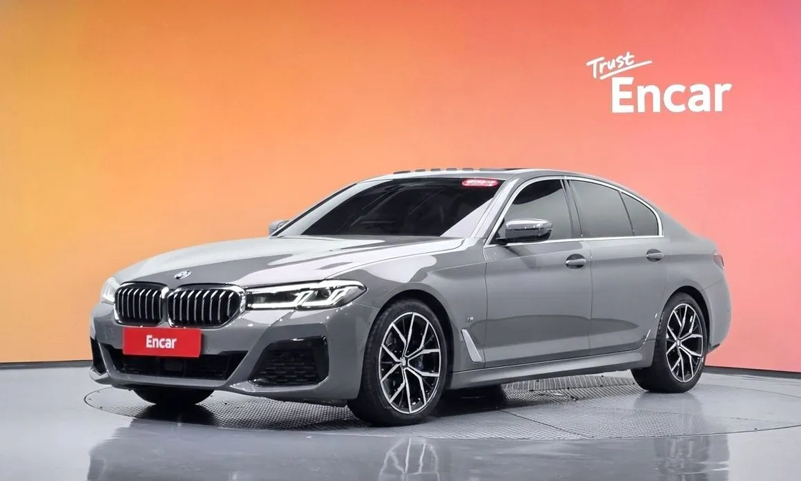 BMW 5-Series — фото 1