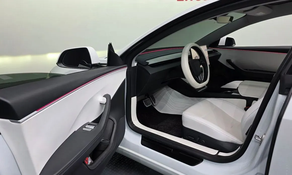 Tesla Model 3 — фото 9