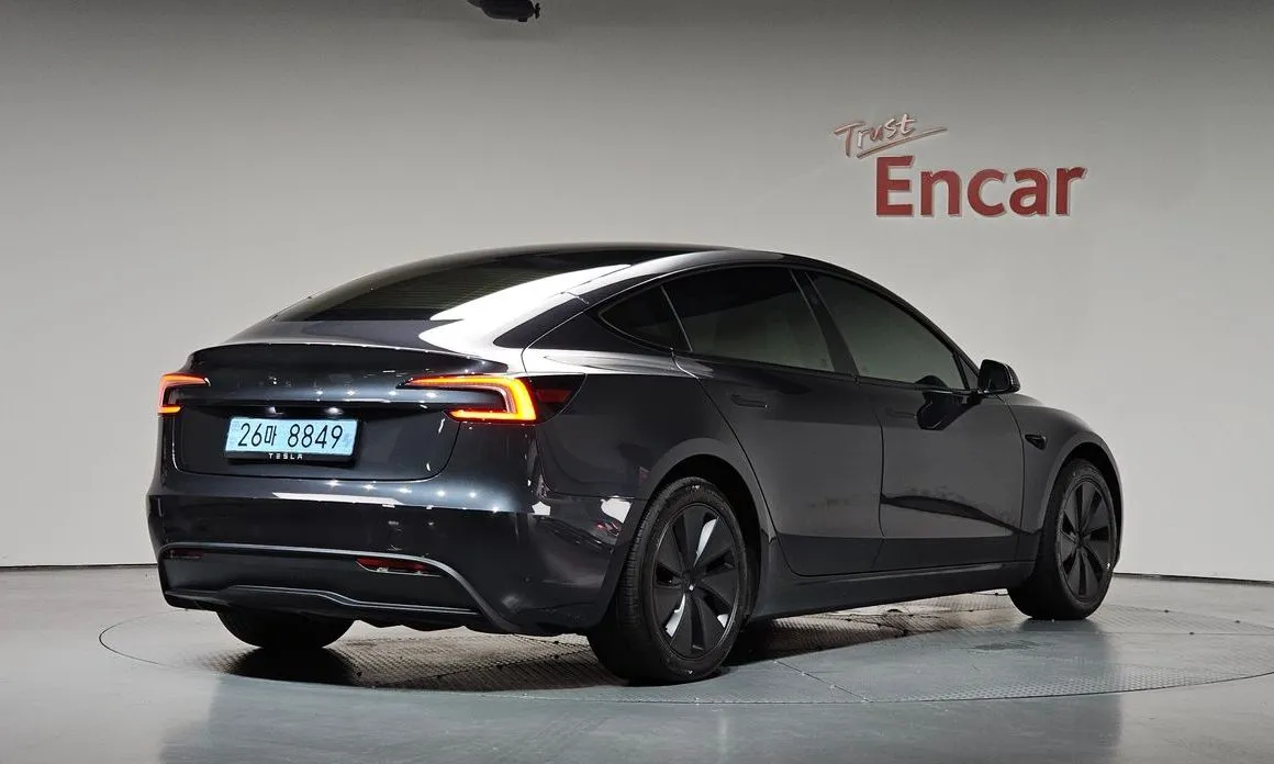 Tesla Model 3 — фото 5