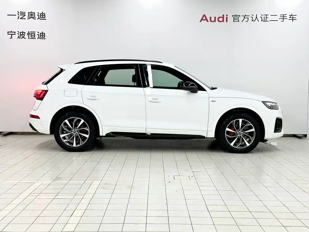 Audi Q5L — фото 9