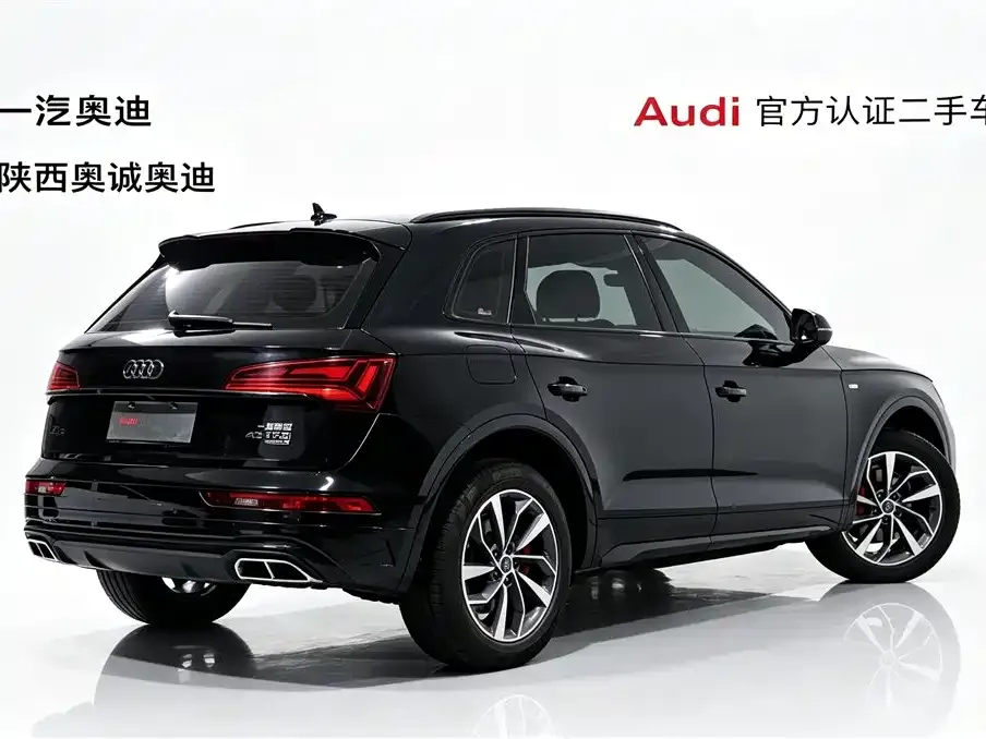 Audi Q5L — фото 10