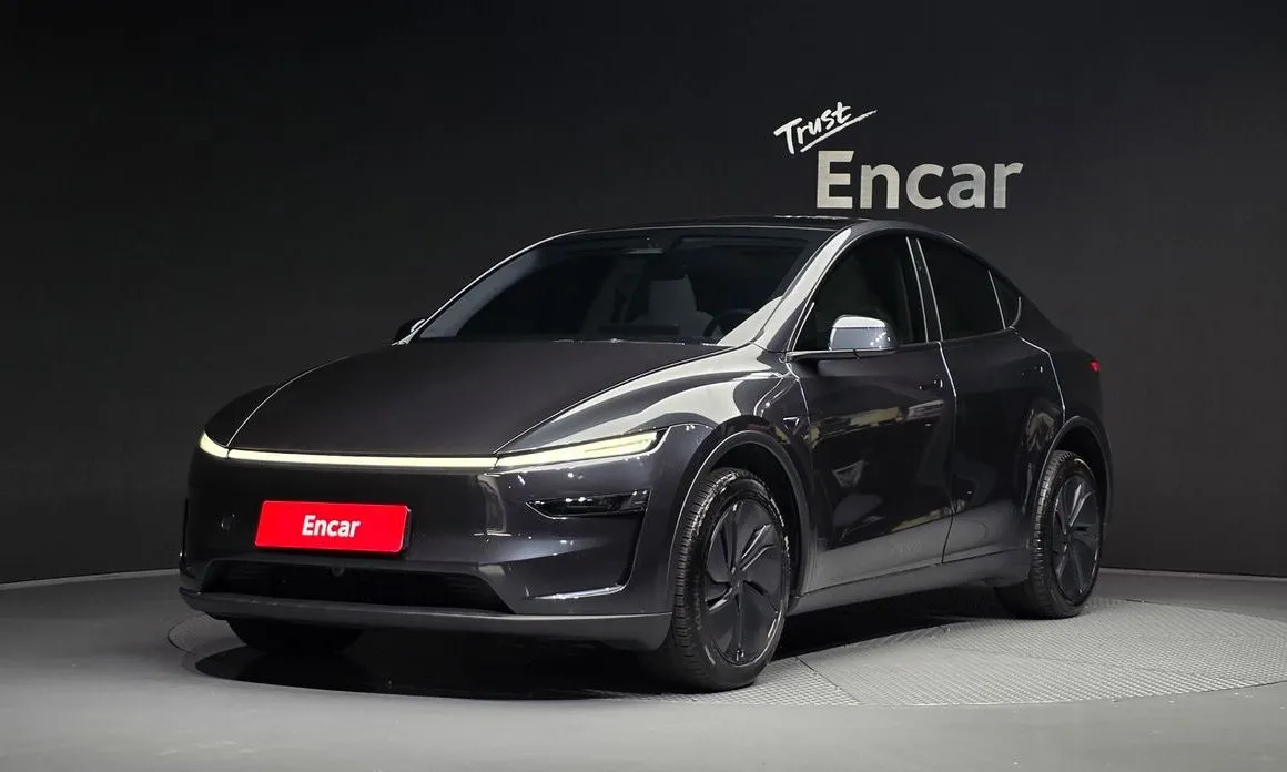 Tesla Model Y — фото 1