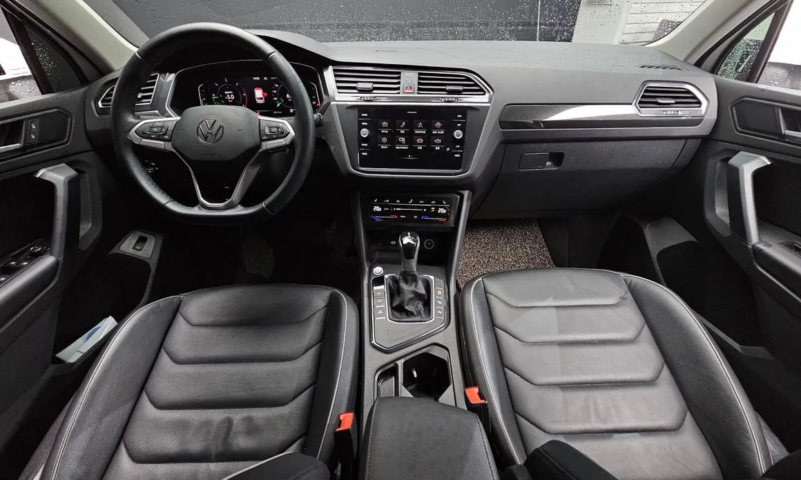 Volkswagen Tiguan — фото 9