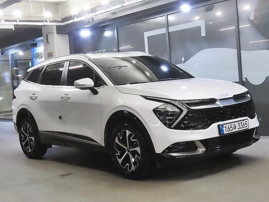 Kia Sportage — фото 1