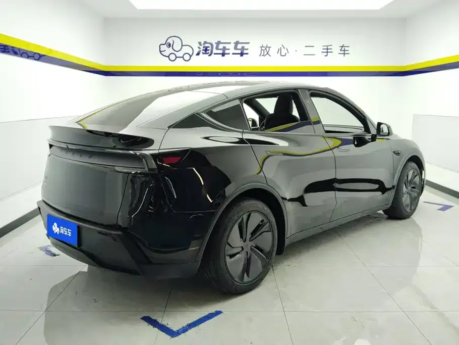 Tesla Model Y — фото 7