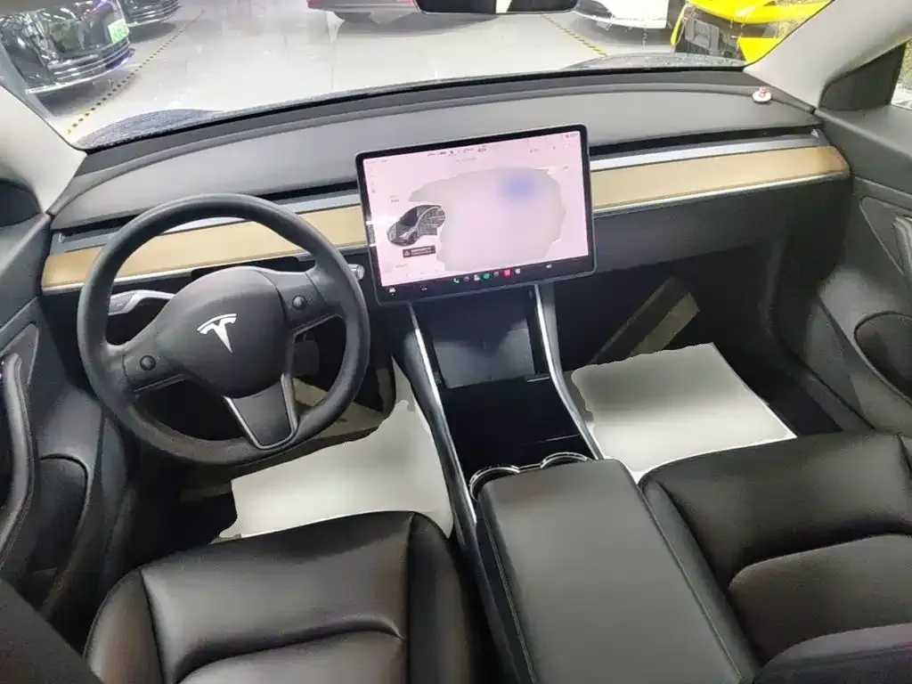 Tesla Model 3 — фото 6