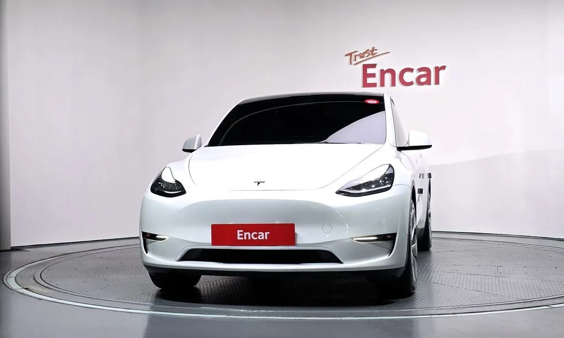 Tesla Model Y — фото 7