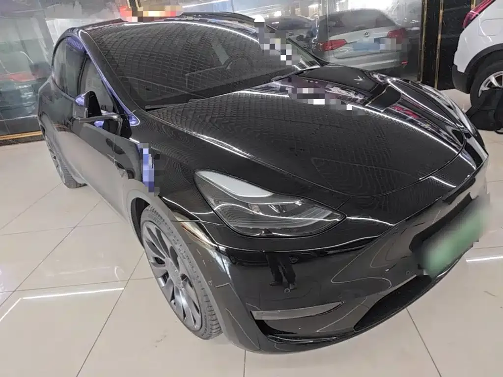 Tesla Model Y — фото 10