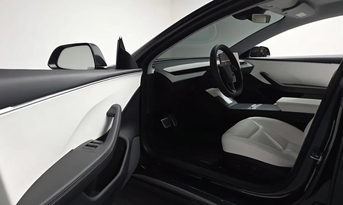Tesla Model 3 — фото 7