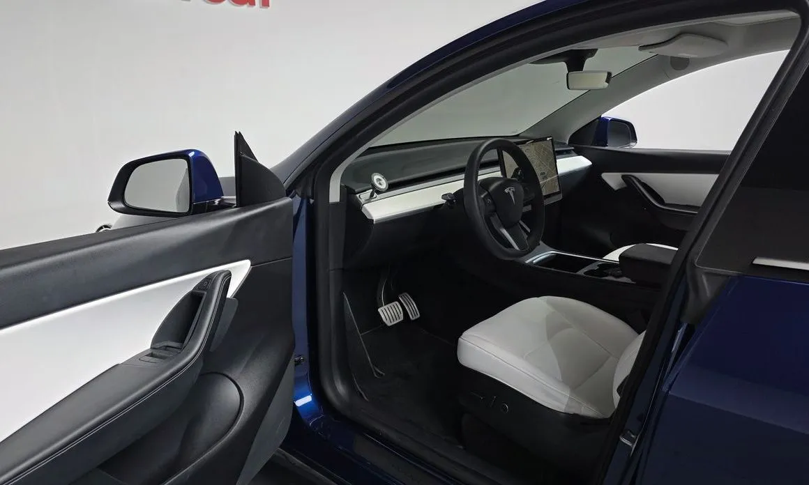 Tesla Model Y — фото 7