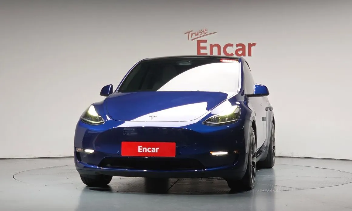 Tesla Model Y — фото 9