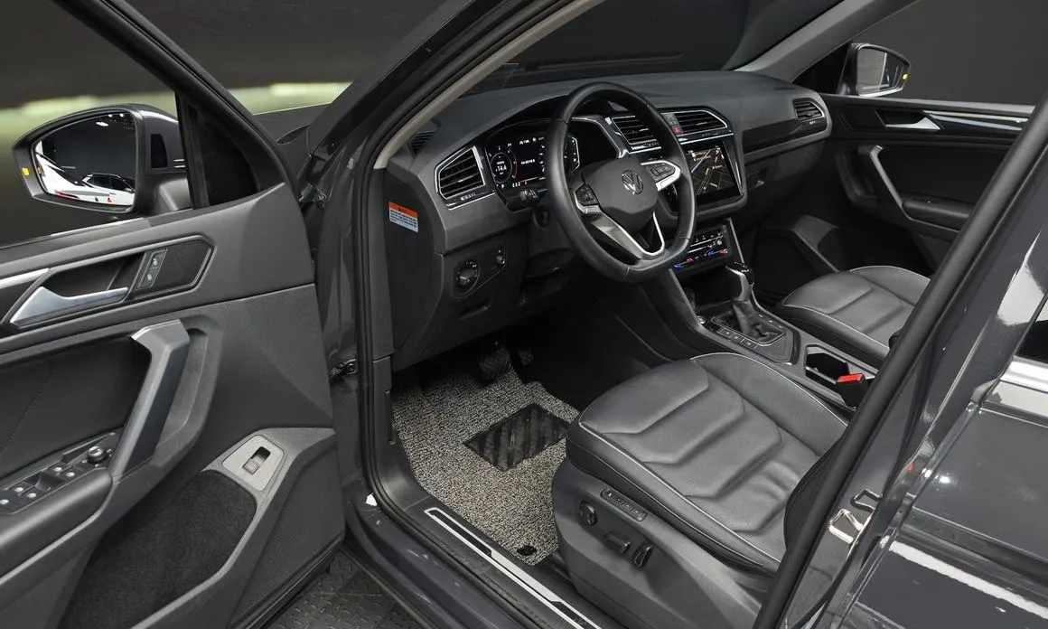 Volkswagen Tiguan — фото 9