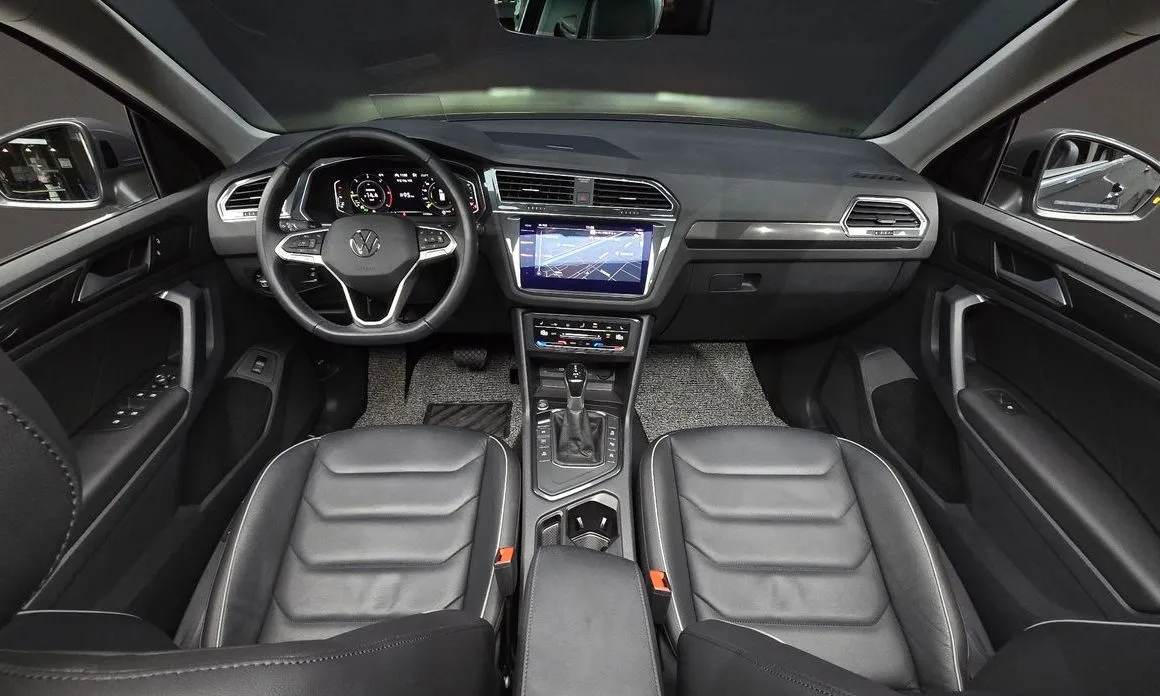 Volkswagen Tiguan — фото 7