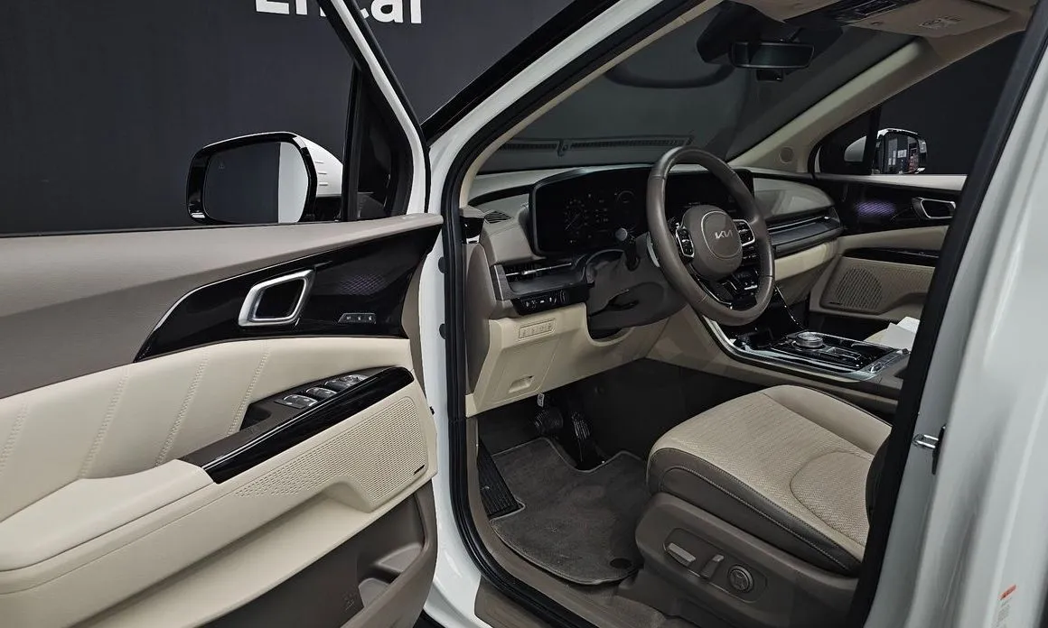 Kia Carnival — фото 10