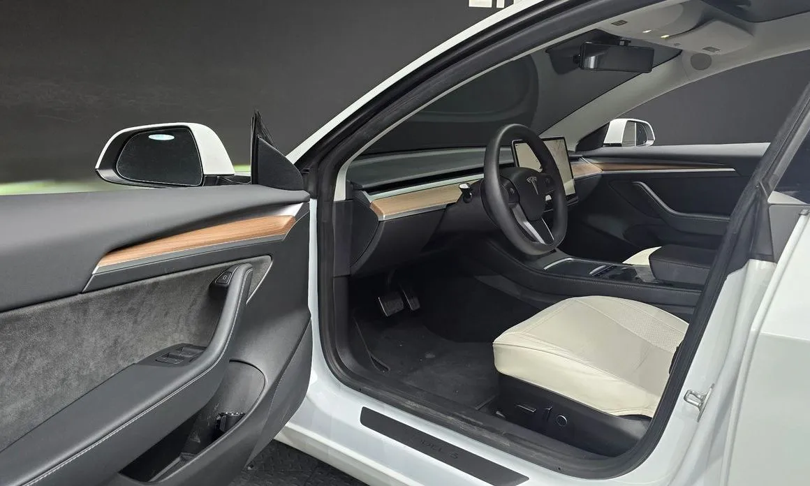 Tesla Model 3 — фото 10