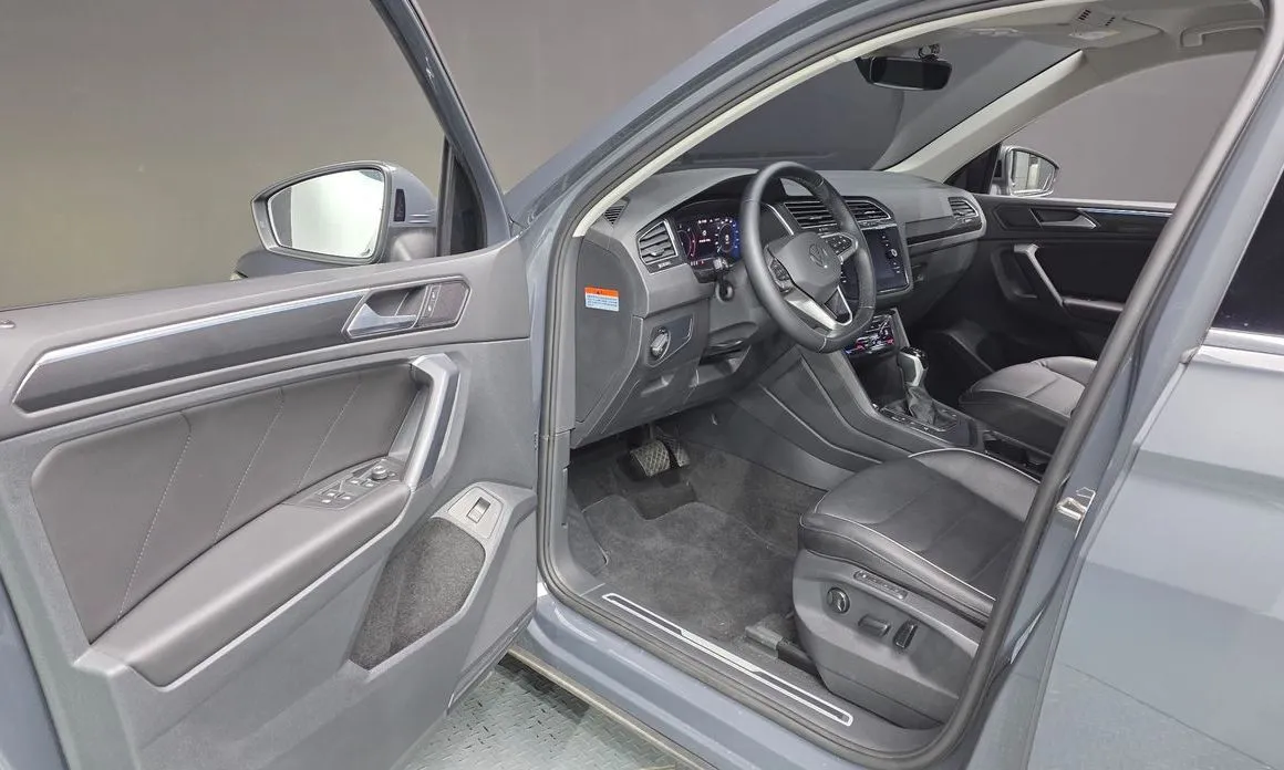 Volkswagen Tiguan — фото 10
