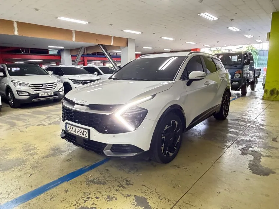 Kia Sportage — фото 1
