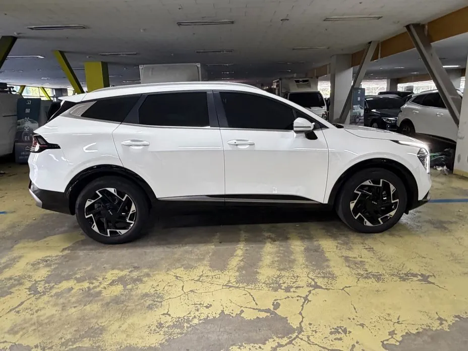 Kia Sportage — фото 5