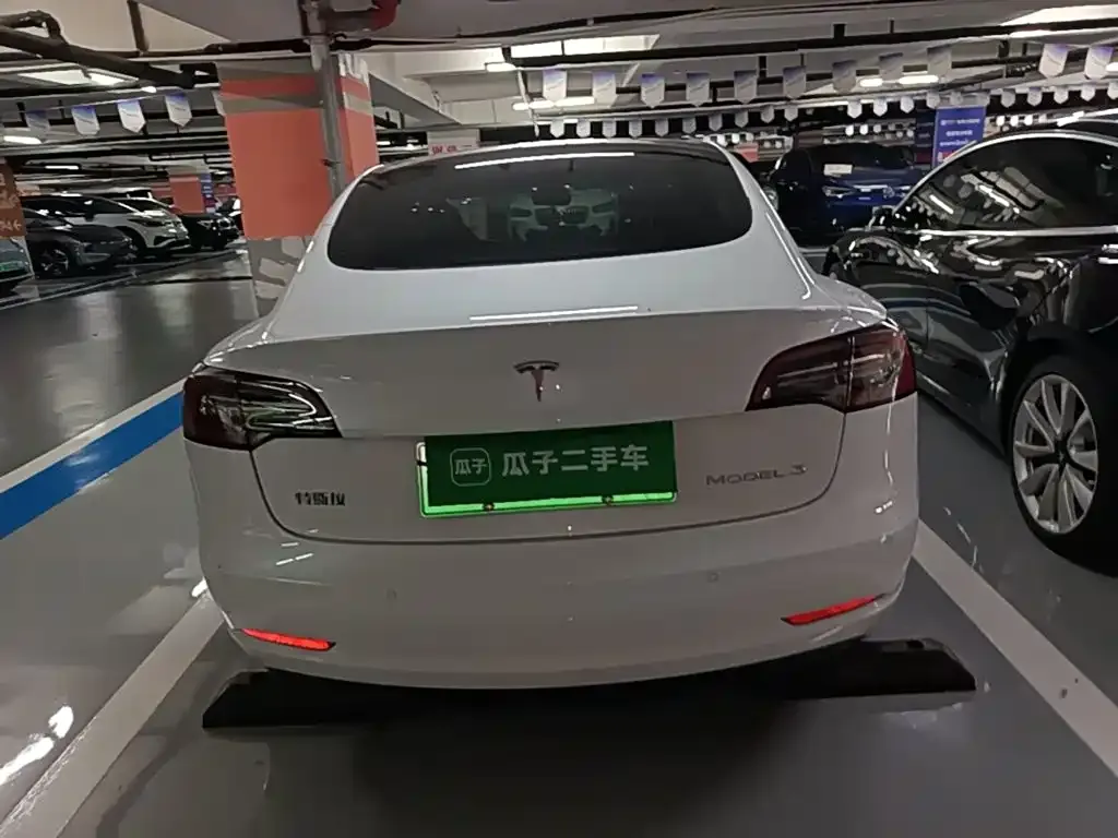 Tesla Model 3 — фото 10