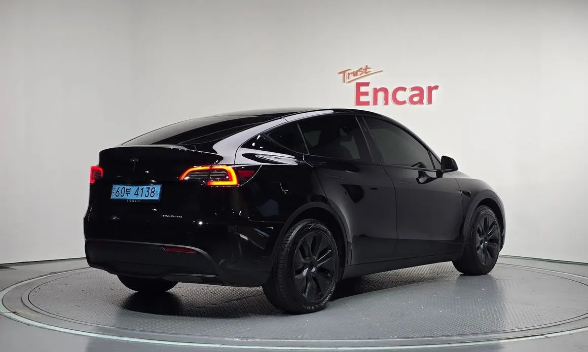 Tesla Model Y — фото 8