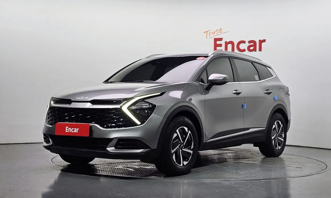 Kia Sportage — фото 1